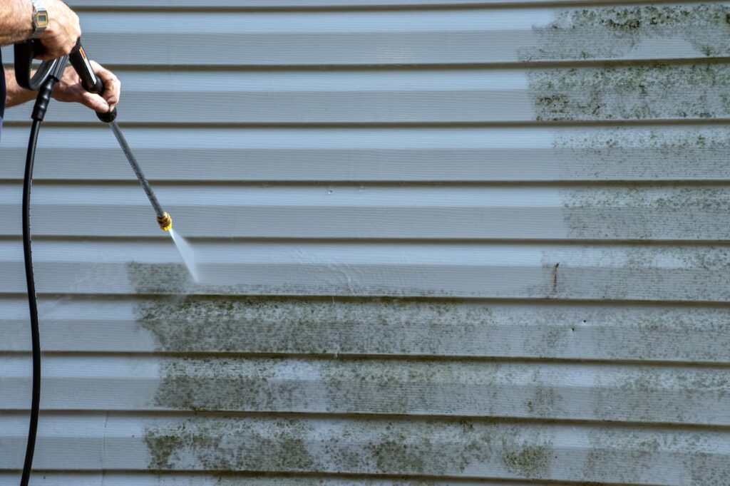 Pressure Washing Vinyl Wall