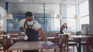 Workers Cleaning Restaurant