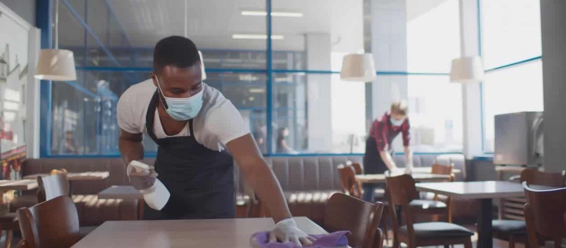 Workers Cleaning Restaurant